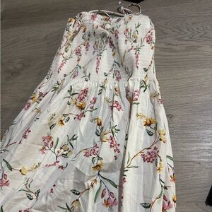 H&M blue and white floral pattern dress with adjustable straps.